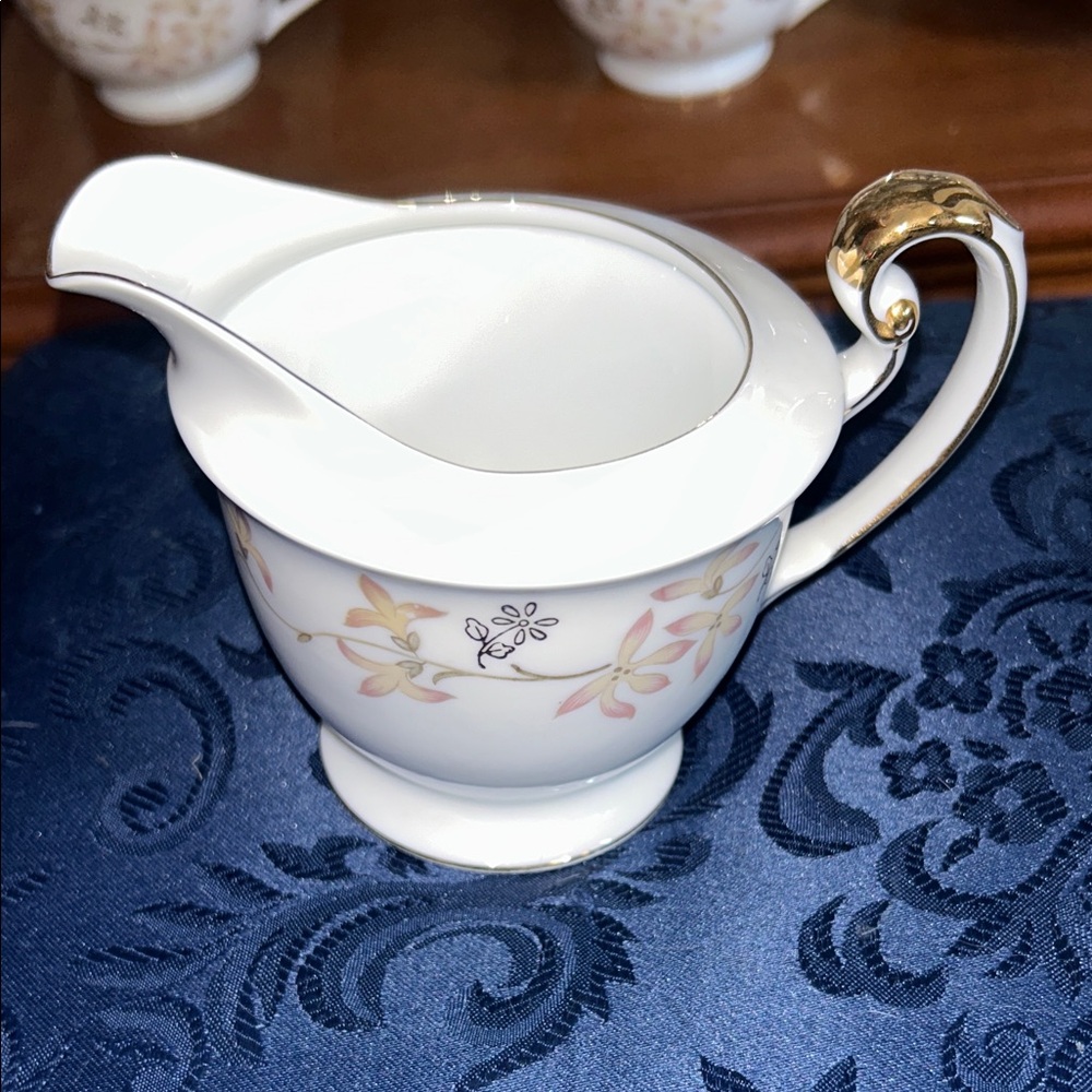 Porcelain Creamer Pitcher with Gold Trim and Floral Motif